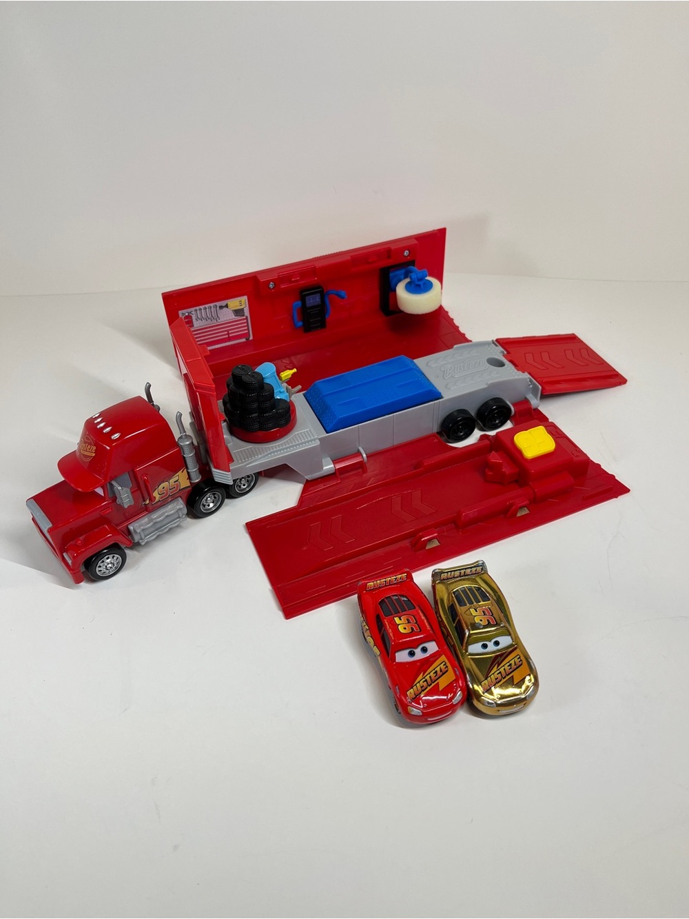 Disney Pixar Cars Transforming Mack Playset W Golden Lightening McQueen Lot Toys